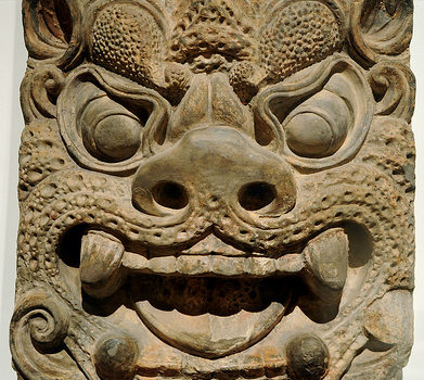 Ogre Mask, on brick, (or Zephr), molded terracotta, traces of paint, Tang dynasty (618-907), Xinuningsi pagota, Temple Where Contemplation Is Cultivated, Mount Qingliang, China – collection Art Institute, Chicago, Illinois, USA